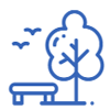 Bench and Tree with birds in sky 